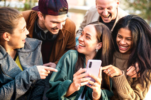 Group laughing at phone